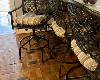 Four patio swivel bar stools by Patio Living. 