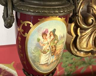 Pair of French bronze and hand painted porcelain girandoles 