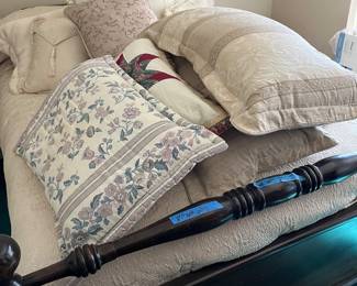 Lots of pillows on the bed