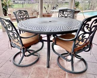 Heavy Metal Patio Table Four Rocking