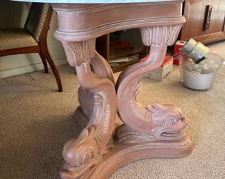 Dolphin Base Regency Style Table. Heavy quality piece. Marble top table.