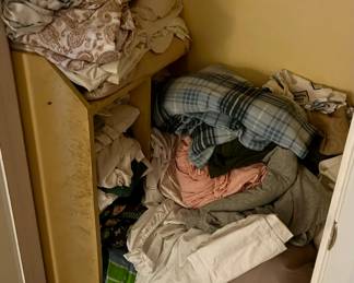 Room dedicated to linens, clothing, etc. More than this. 