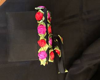 BLACK EVENING PURSE WITH ROSETTES