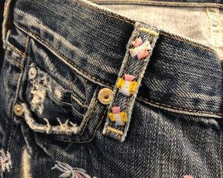 DETAILS OF STITCHING BY ZAC POSEN SEVEN FOR MANKIND