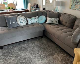 Gray sectional sofa, Cindy Crawford in excellent condition smaller can be used on either side.  This will be sold in part 2 of the sale.  You can pre purchase with pick up in Aug.