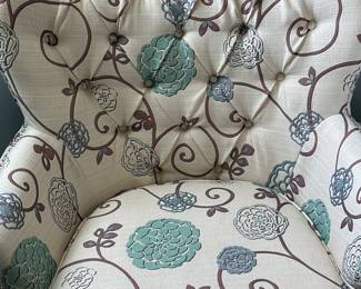 we have two of these off white and blue flower chairs 