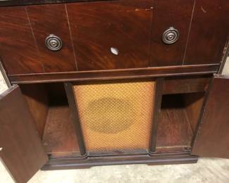 vintage wood record player console cabinet.  Works 