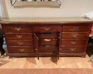 $260 USD     MAKE OFFER Traditional Cherry 9 Drawer Dresser TM193-21     This dresser is a classic, traditional dresser with a lot of space for storage.  The top has been protected with glass.

Dimensions: 72 x 20 x 33"H

Condition:  Very good condition

Local pick up Sterling, VA.  Contact us for shipper suggestions.     https://goodbyhello.com/products/traditional-9-drawer-dresser-tm193-21?_pos=4&_sid=07fb111e5&_ss=r