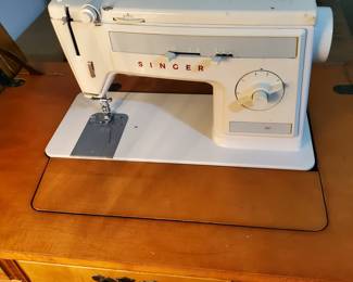 Singer 1021 in maple cabinet