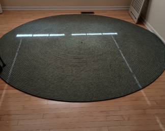 Eight 8'  diameter round Rug
Green 
