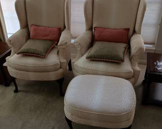 Wingback chairs with one ottoman