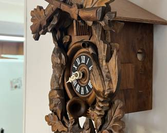 ONE OF SEVERAL CUCKOO CLOCKS