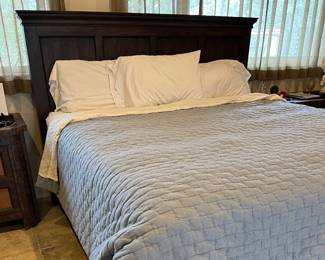 King size wood panel bed frame/headboard. 
70.5w x 86d x 57.5h Excellent condition with one small chip in wood on base towards foot board. (no linens)