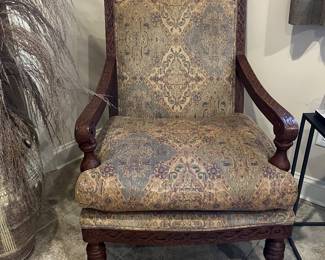 PRESALE AVAILABLE! Large carved wood armchair with kilim like upholstery. 
42h x 29w x 28d
