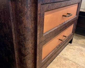 Pair of 2 drawer bed side chests with pull out trays. Brass handles. Leather inset drawer fronts. Some flaking on top finish of both, small ding on corner of one. Refinishing oil should take care of these small blemishes.  44w x 30h x 22.5d