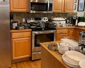 Full kitchen of cookware, bakeware, and vintage Corning Ware