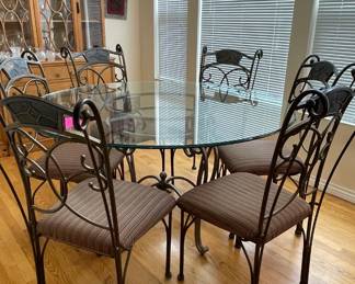 Glass-top table and six chairs