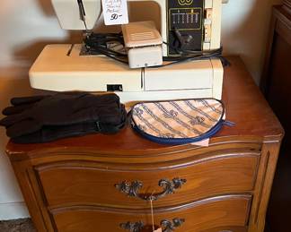 White sewing machine, night stand