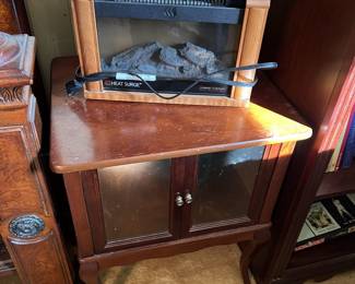 Small display cabinet, Heat Surge Electric Fireplace