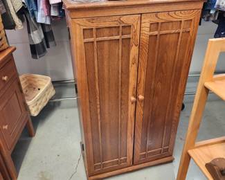 CD/DVD cabinet w shelves. I think would make a great bar