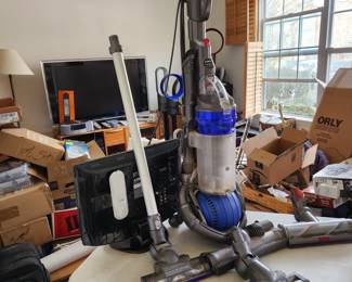 Dyson vacuum cleaner and extra brush heads