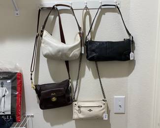 Coach and other Quality purses and handbags.