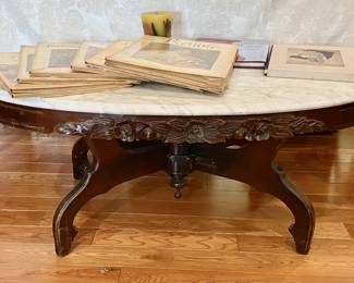 Antique longer Oval Marble top Cherry wood coffee/cocktail table.