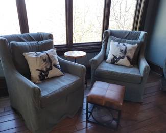 Slipcovered swivel chairs