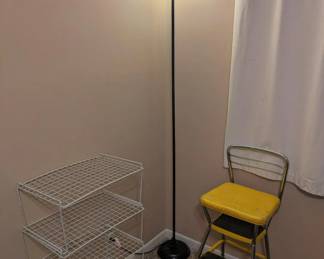 stool chair, lamp and wire shelves.