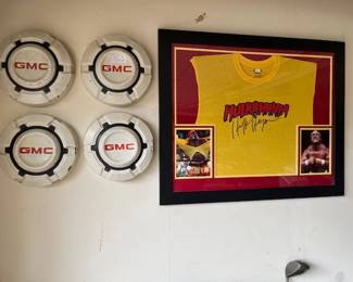 GMC hub caps, framed Hulk Hogan signed shirt