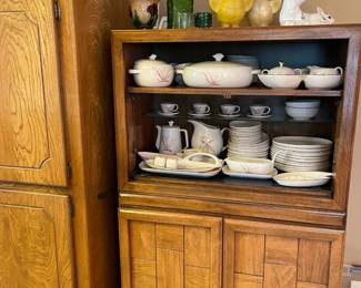 Vintage hutch, showing the Winfield set, vintage bird money boxes, vintage glass and art glass