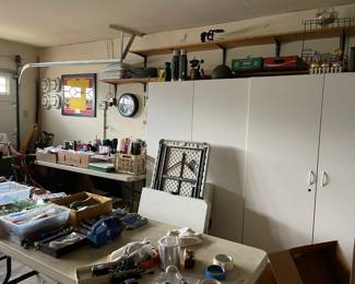 White storage cupboards, Lots of tools