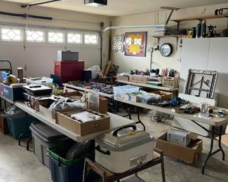 Looking into the garage. Lots of tools, pottery, china, glass and so much more!