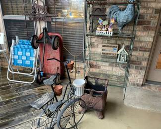 Metal bakers rack, cast iron  container, bird houses, rooster, planters, bird cage stand