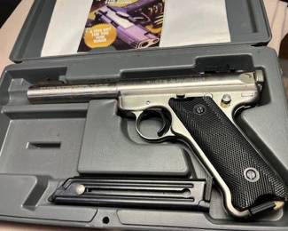 Comes in the case and with an extra magazine