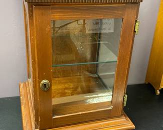 1 of 2 lighted display cabinets