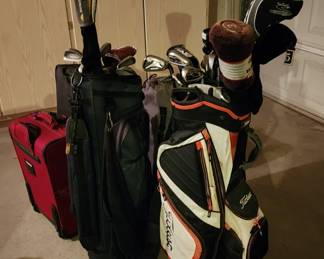 2 sets of Gold Clubs