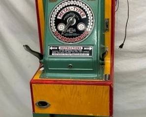10C METAL TYPER COIN OP MACHINE