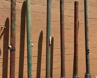 VARIOUS EARLY SIGN POLES W/ BASES