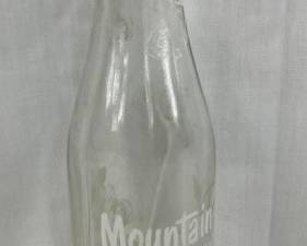 BOTTLE IS MARKED 7 OZ