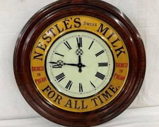 19IN EARLY NESTLES MILK TIN CLOCK