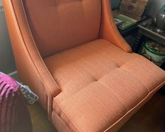 Modern orange chair. Comfortable and in great condition. 