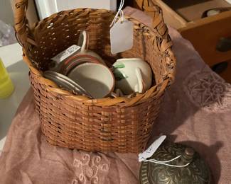 Choctaw basket with old play dishes inside     Hotel bell 