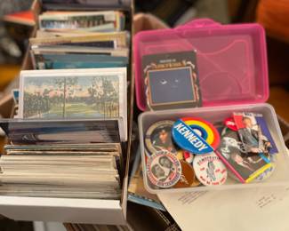 Postcards and old political pins   There are a million postcards here!