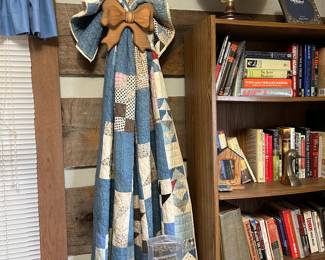 beautiful handmade quilt with hanging rack 