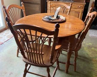 . . . oak dining table and chairs