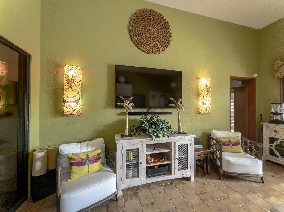 designer bamboo accent chairs, tiki lights, matching console and bar cart (not pictured)