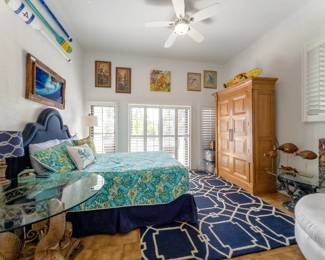 Queen size bed, parrot art, manatee base coffee table, resin fish dining table base (pictured with smaller glass top)