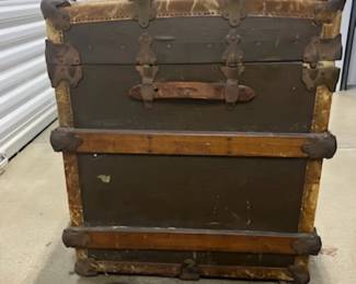 Vtg. Petersen's Steamer trunk $180. - This item is off-site in Willow Springs. Please contact Eric at 708-218-4242 for further information.   PLEASE NOTE - THE OFFSITE ITEMS WILL NOT BE SUBJECT TO ESTATE SALE DISCOUNTING. THANK YOU.