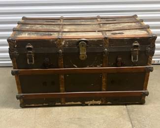 Vtg. Petersen's Steamer trunk $180. This item is off-site in Willow Springs. Please contact Eric at 708-218-4242 for further information.  PLEASE NOTE - THE OFFSITE ITEMS WILL NOT BE SUBJECT TO ESTATE SALE DISCOUNTING. THANK YOU.